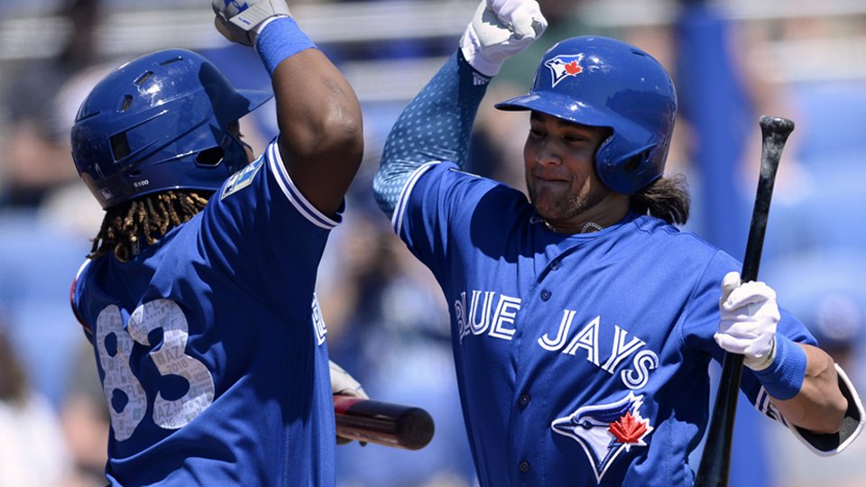 Vladimir Guerrero Jr. and Bo Bichette celebrate