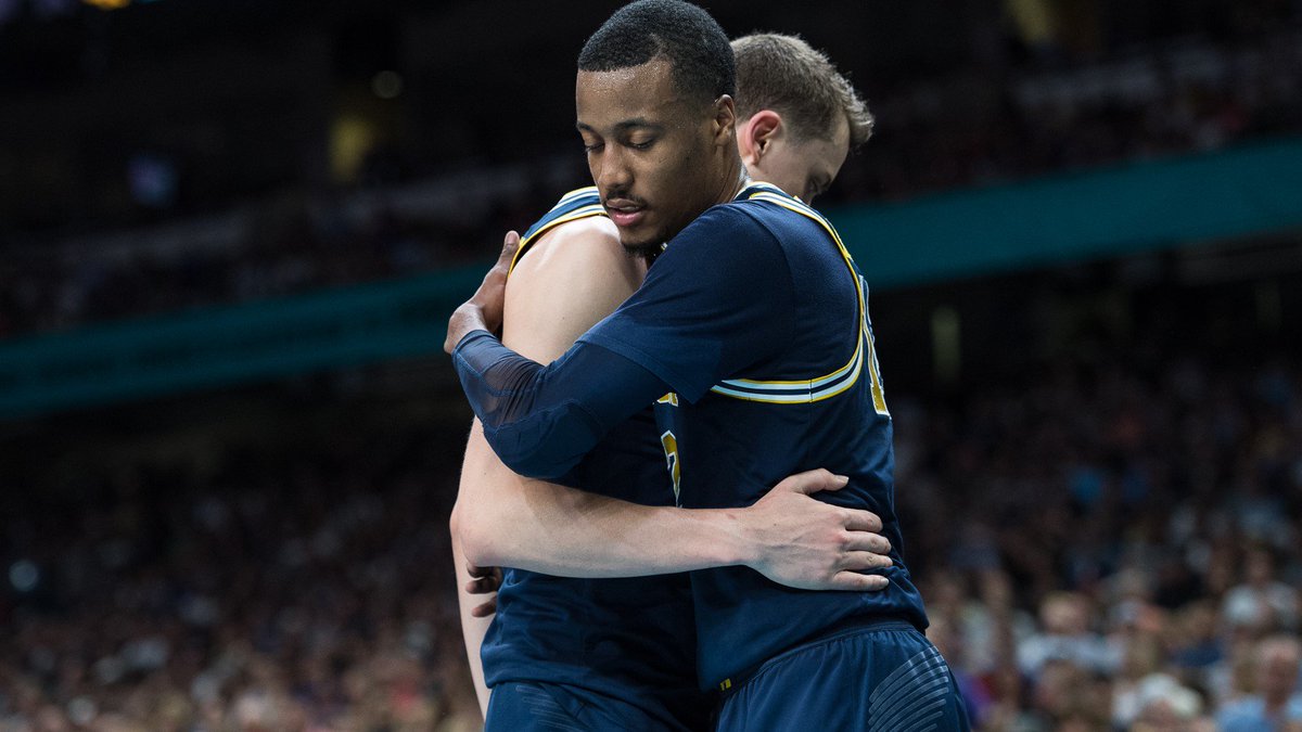 UMichAthletics's tweet photo. "We're 33-8 and nobody's ever going to take that away from us. And in my heart forever, you will always be champions.” - @JohnBeilein

STORY » https://t.co/wPiRnFYrjb

#GoBlue https://t.co/QDUEBrcaZP