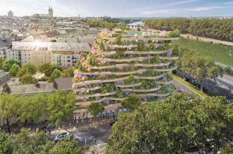 Angers in France becomes the new setting for a vertical forest containing residential units 👏🌲 Could this make citizens want to be more eco-friendly? Has Vincent Callebaut, the architect, started a new type of building design? 🍃😊