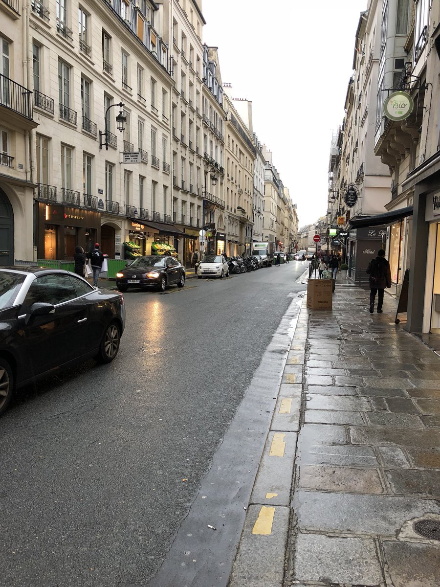 pattonoswalt's tweet image. If you can, make your depression look like this street. Bleak and rainy but there’s music and art and even comedy hiding in its lonely cafes and you can use those to escape.