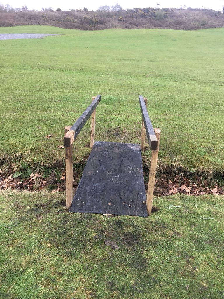 BSGCGreens's tweet photo. We here @HertsGCC like to make sure we’re giving our members the best we can. So when the ‘lake’ on 17 reaches the ditch and makes it almost impossible to reach the fairway from the tee. we don’t close the hole, oh no, we build you a bridge. #alwaysanotherway @CrownGolf https://t.co/rXwsRLJzZA