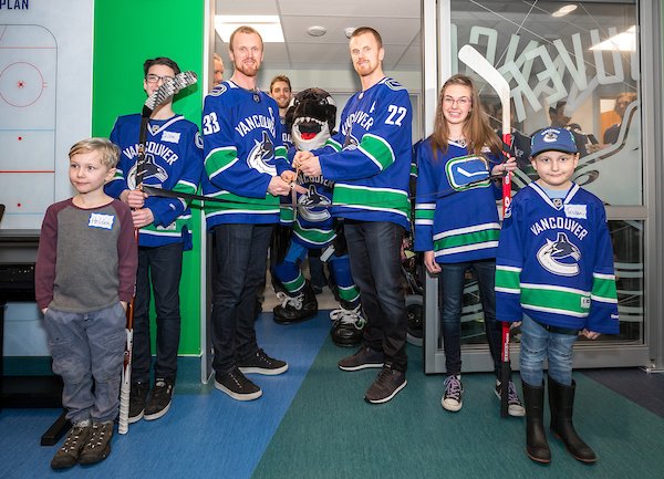 BCCHF's tweet photo. “In 2010, together with their families, Henrik and Daniel donated $1.5 million to help build the Teck Acute Care Centre and were recently on hand to help open the @Canucks-themed playroom. Our warmest thanks for making #BCCH a priority in  your lives." – Teri Nicholas https://t.co/0Psz5xiUwc
