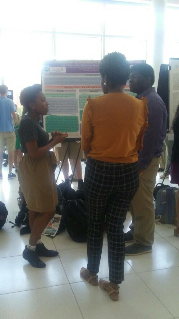 scsupported's tweet photo. Seniors Julia Brisbane and Joseph Murphy presenting research results at the FoCI poster session @CIClemson #nsfincludes #ClemsonCECAS https://t.co/qciARKTJSi