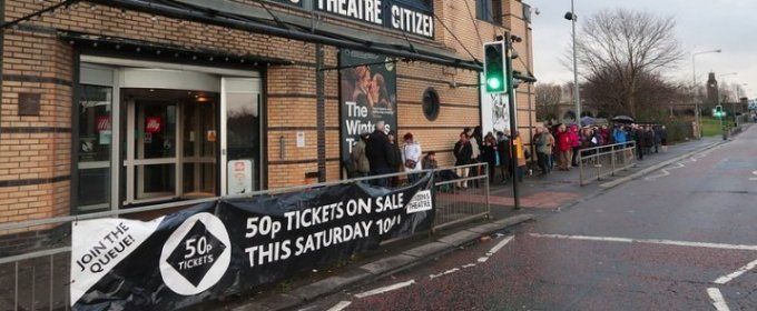 queue outside citizens theatre behind a 50p tickets banner