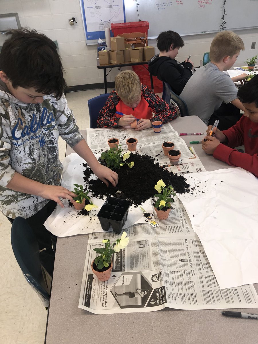 ro16h's tweet photo. Students planting flowers for the nursing home residents #cescougars #projectjack https://t.co/fnOEaUMXfV