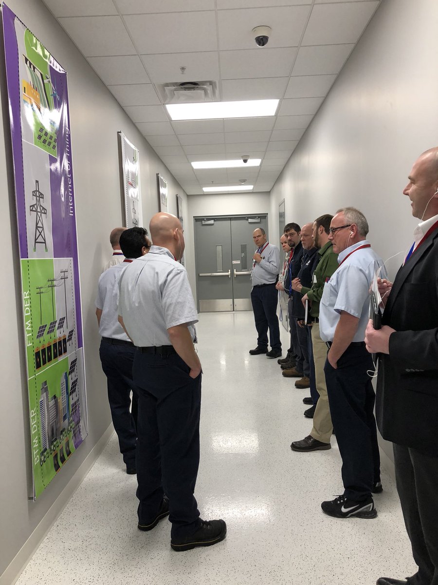 The @bomampls tour of the @OATIinc Microgrid Technology Center is underway! USA MG’s Glen Fisher explains the Grid 1.0 to Grid 4.0 banners- showing how the power grid has evolved thru the years. Next stop: Mechanical room.