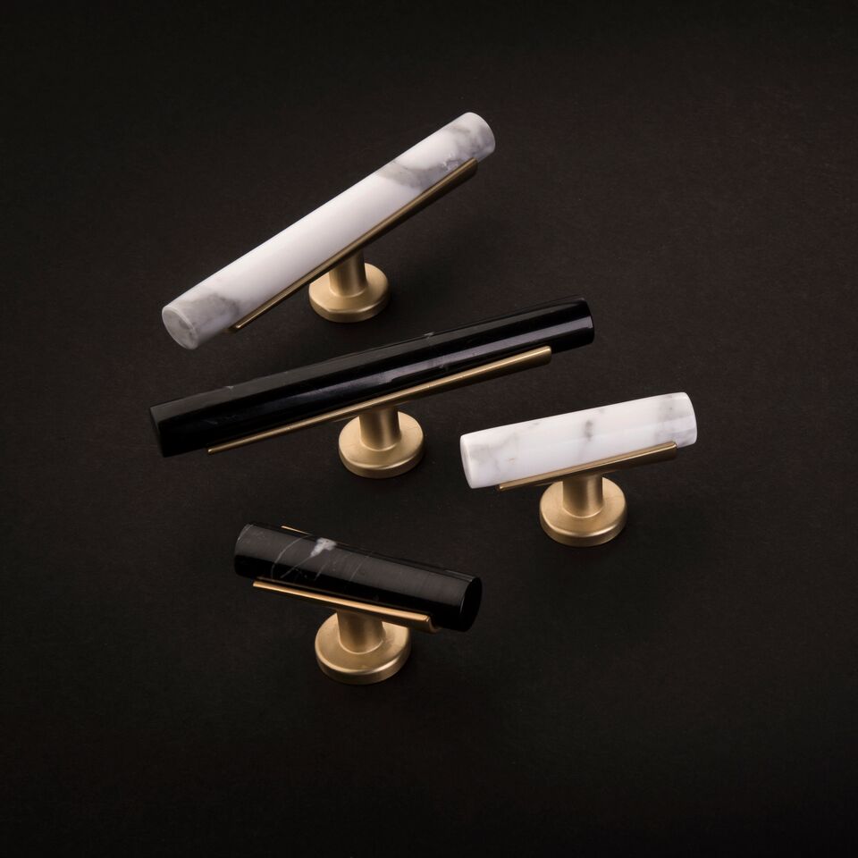 A1: Clean lines are one of our favorite elements of #ModernDesign.Coupled with an ability to mix finishes and colors, designs like our Firenze collection, which mixes a variety of marbles and finishes, create a stunning focal point. #cabinetjewelry #KBTribeChat