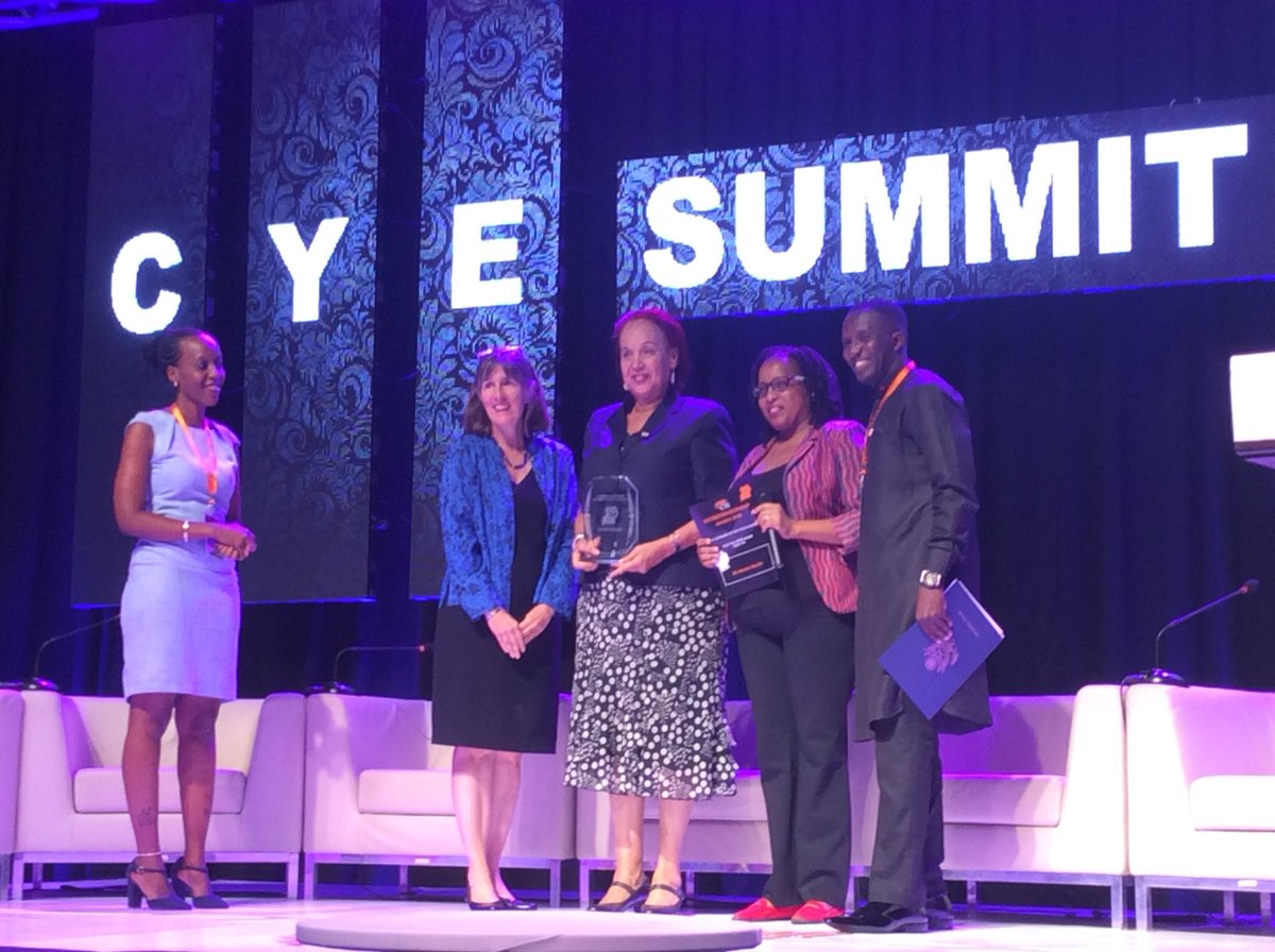 KigoziMaggie's tweet photo. #CYEUg Summit Proud recipient of the Life Time Acheivement Award from the Chamber of Young Entrepreneurs Ug. I receive the award from the Deputy US Ambassador and Maria from the URSB. Thank founder CYE Edwin Musiime for recognising the work I do for youth economic empowerment. https://t.co/5478Zb0nmX