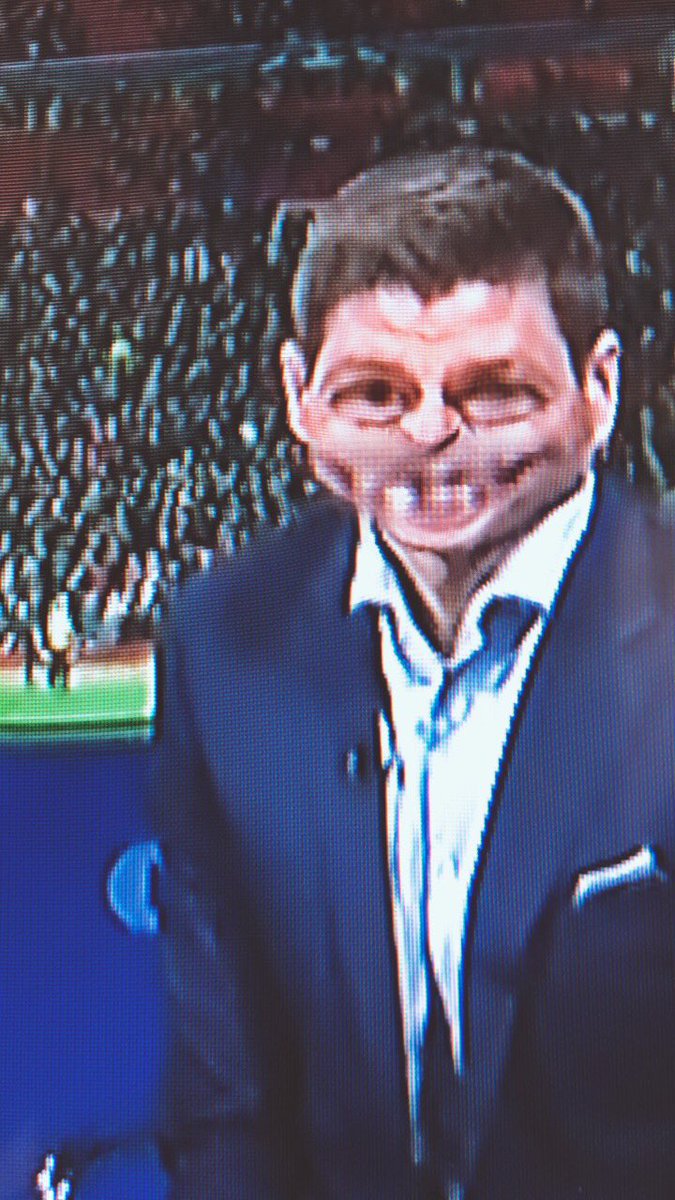 paddypower's tweet photo. Tried to use a Snapchat filter on Steven Gerrard to make it look like he had a big smile at half time, but instead it turned out like this absolute monstrosity and now I’ll never sleep again. https://t.co/LWpuVve0lf