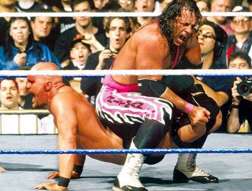 NatbyNature's tweet photo. 21 years ago today. 
One of my favorite #WrestleMania matches of all time. The storytelling was just incredible. So much was accomplished from this masterpiece. 💗🖤+🐍 @BretHart @steveaustinBSR #wrestlemania13 https://t.co/fjo95Ls0CL
