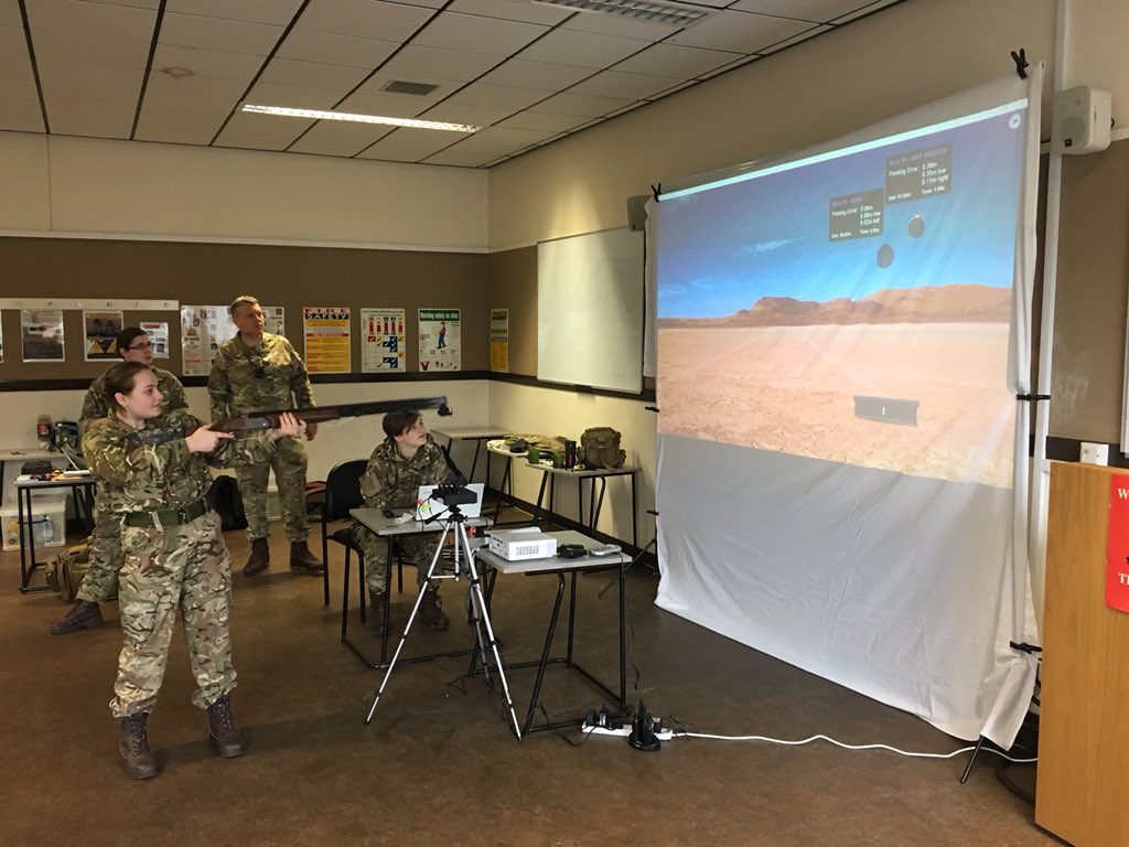 Cadets on a shooting development weekend training on the clay target simulator.