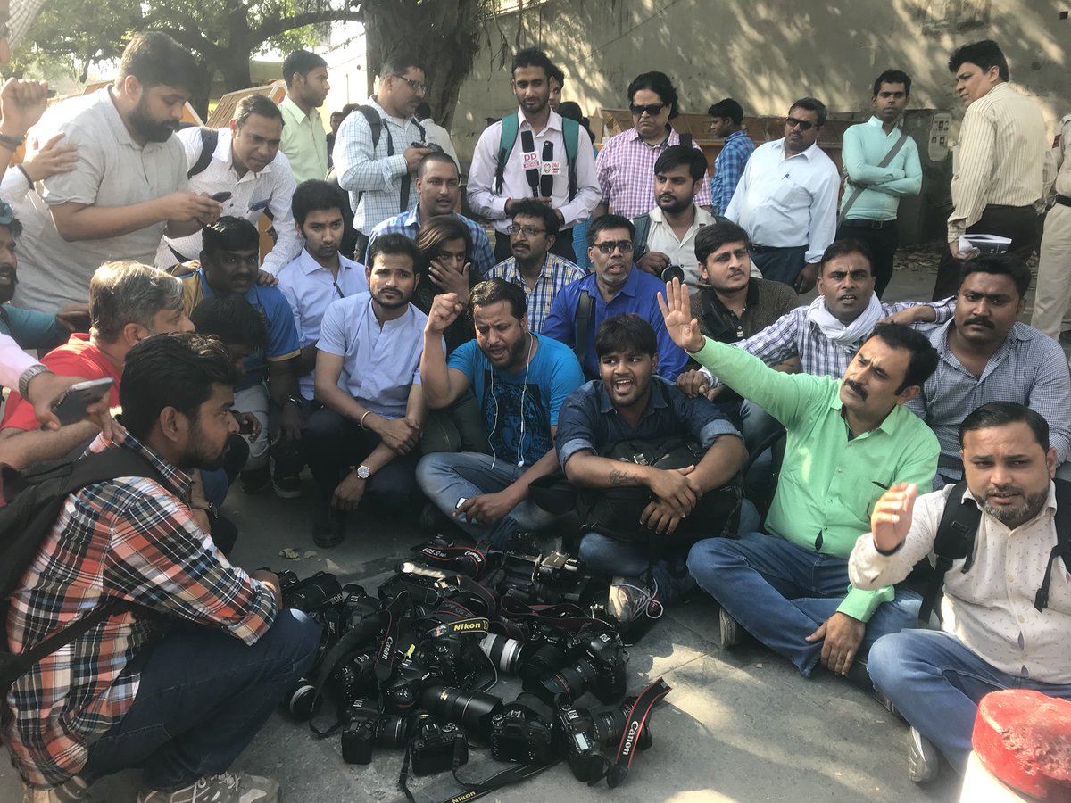 choudharyview's tweet photo. We are protesting outside of @DelhiPolice hq @IPSMadhurVerma @CPDelhi @hmra @pmo please come and arrest us! Or stop harassing photojournalists. https://t.co/AO1w6iKgeR