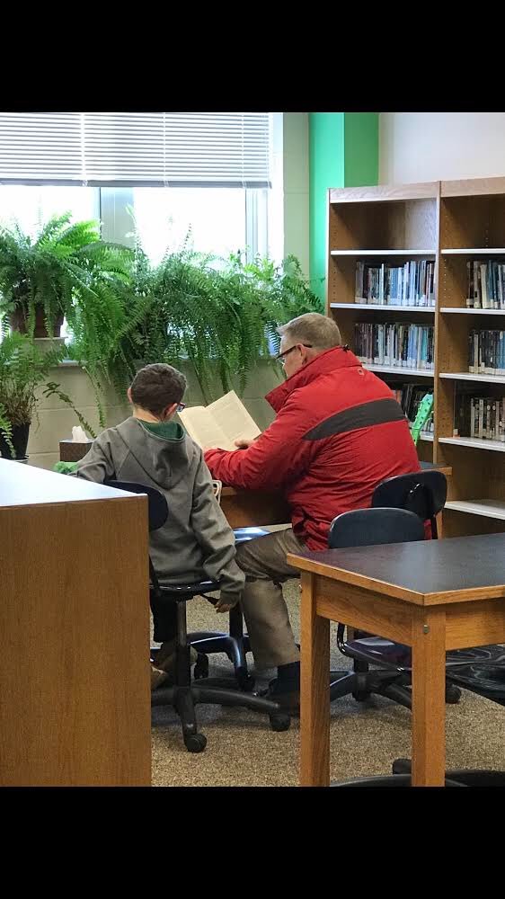 AthensCitySD's tweet photo. Athens Middle Schooler, Corbin, is rewarded with some one on one reading time with local banker Brian Hall! Thank you Brian for volunteering your time to visit our amazing students. #AthensBulldogs https://t.co/svkuoZ8M46