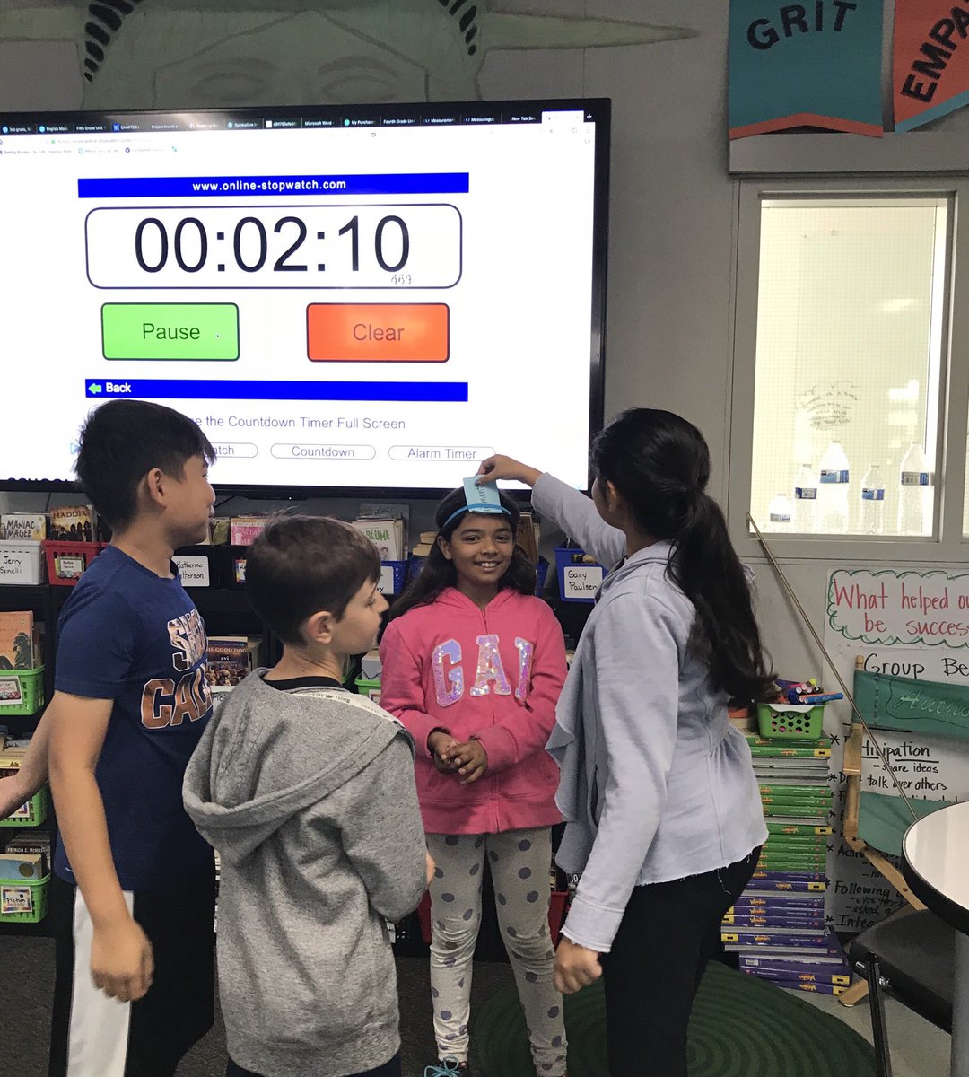 Making movement with our vocabulary words on Fun Friday in Jonesville. Headbandz type game for the win! #OAJonesville #OASharks #engagedlearning