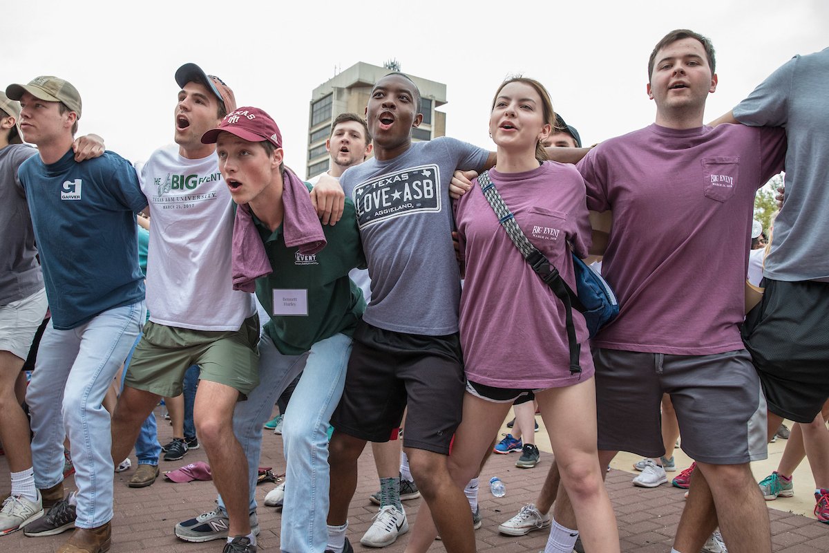 Six Aggies sawing 'em off in a group at the Big Event Kickoff