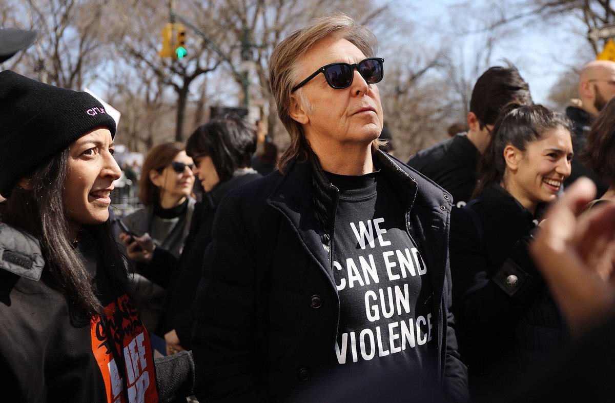 paul mccartney is marching in nyc in tribute to john lennon who lost his life in that city due to gun violence