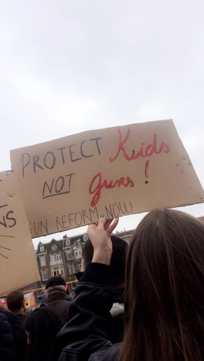PineappleeHood's tweet photo. #MarchForOurLives in Amsterdam today🌼 https://t.co/cea439HjQb