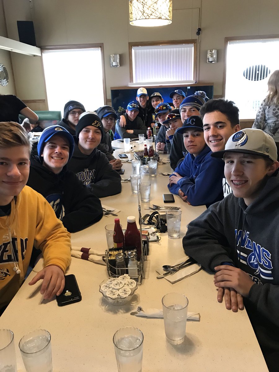 JV players enjoying breakfast after their morning of work.