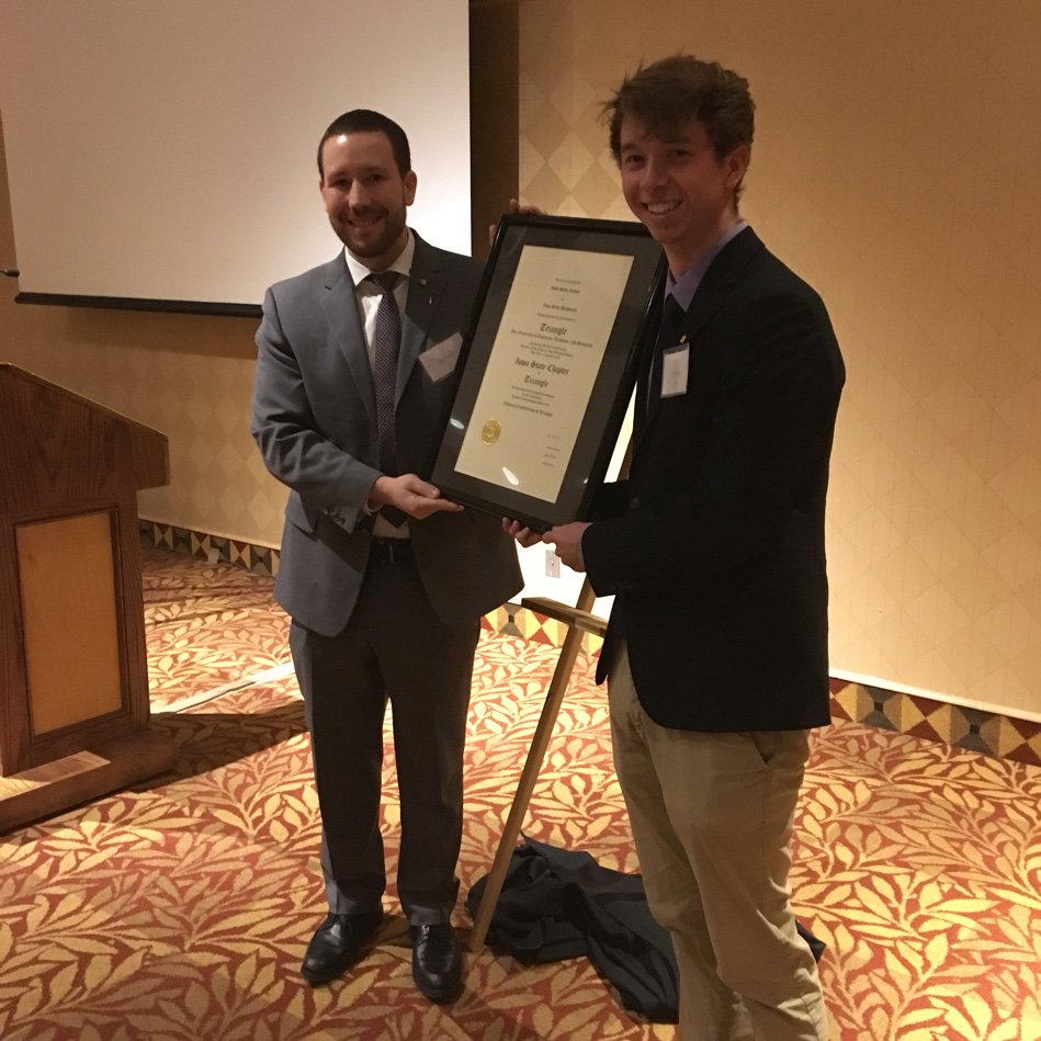 Triangle_ED's tweet photo. CHAPTER President Tyler Fenton receives the charter from Triangle VP Joe Cerrato. Congratulations Iowa State Chapter! https://t.co/XH3EurcYQx
