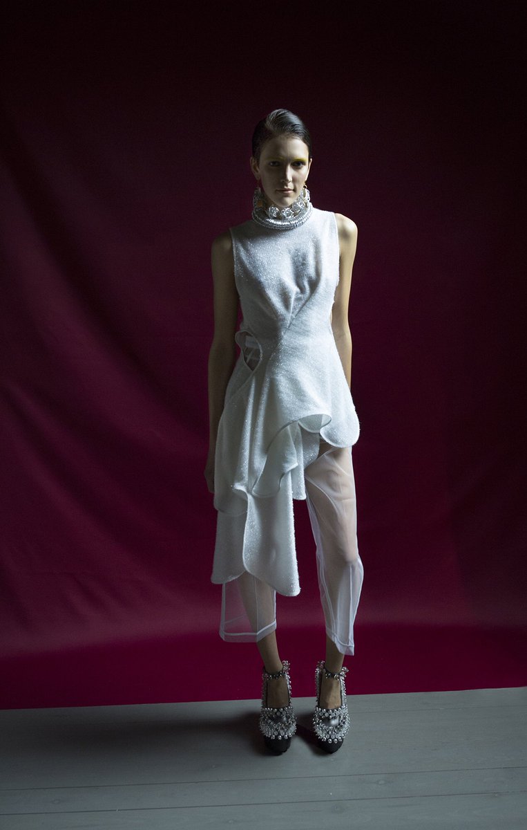 longshawward's tweet photo. White #glitter outfit &amp; #statementjewellery 
AW2018/19 
LFW with @onofflondon
Live shoot on the catwalk - photography: @lilyvetchstudio 
Hair: @cbasciu @richardwardhair @lorealpro 
Make up: @lanslondon 
#EmbellishedShoes #Catwalk #Runway #OnOffLondon #OnOffPresents #LONGSHAWWARD https://t.co/0p2FwJb5xF
