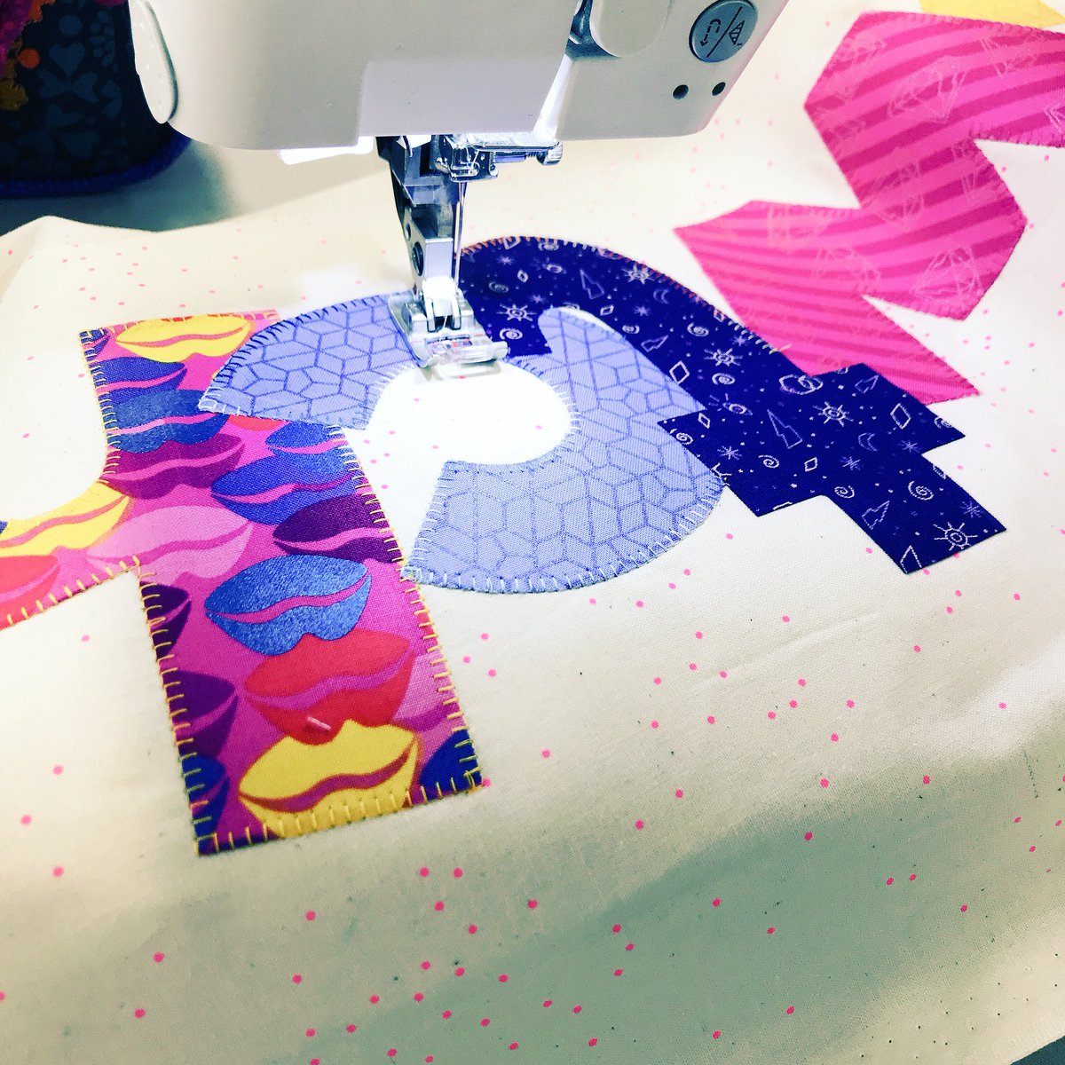madewithmadness's tweet photo. At the first #Huddersfieldmqg meeting and I am smashing off another cushion for my couch favourite word favourite fabrics #libsElliott #aurifil #janomemakes #handmade #cushion #guesstheword https://t.co/pEMtu4GMyS