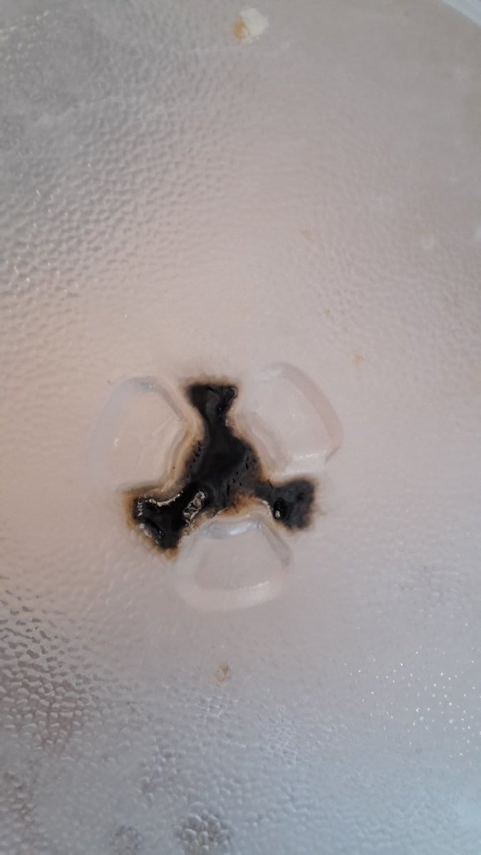 horror_iow's tweet photo. @RussellHobbsUK I bought a Russell Hobbs microwave a year ago but this morning it started smoking from the plate holder. Is a replacement possible? Photos show mark on plate to https://t.co/T8ubNhIukE