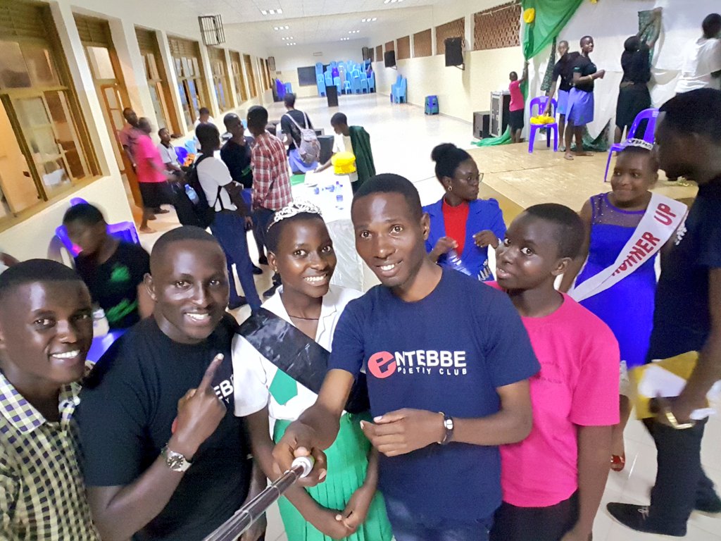 EntebbePoetry's tweet photo. @EbbzPoetryClub Members share a moment with the newly crowned #MissEloquence2018  Today at Nsambya Girls school. 
Her speech was absolutely inspiring. #POETRYUG @jasonntaro https://t.co/g2K8cjIRjt