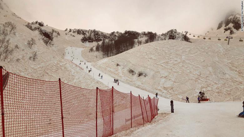 cnnbrk's tweet photo. Skiers and snowboarders in Sochi, Russia, were met with orange-tinted snow after a massive sandstorm from northern Africa blew up through Greece and into Russia https://t.co/FIMF0c41V8 https://t.co/nPBJejI12S