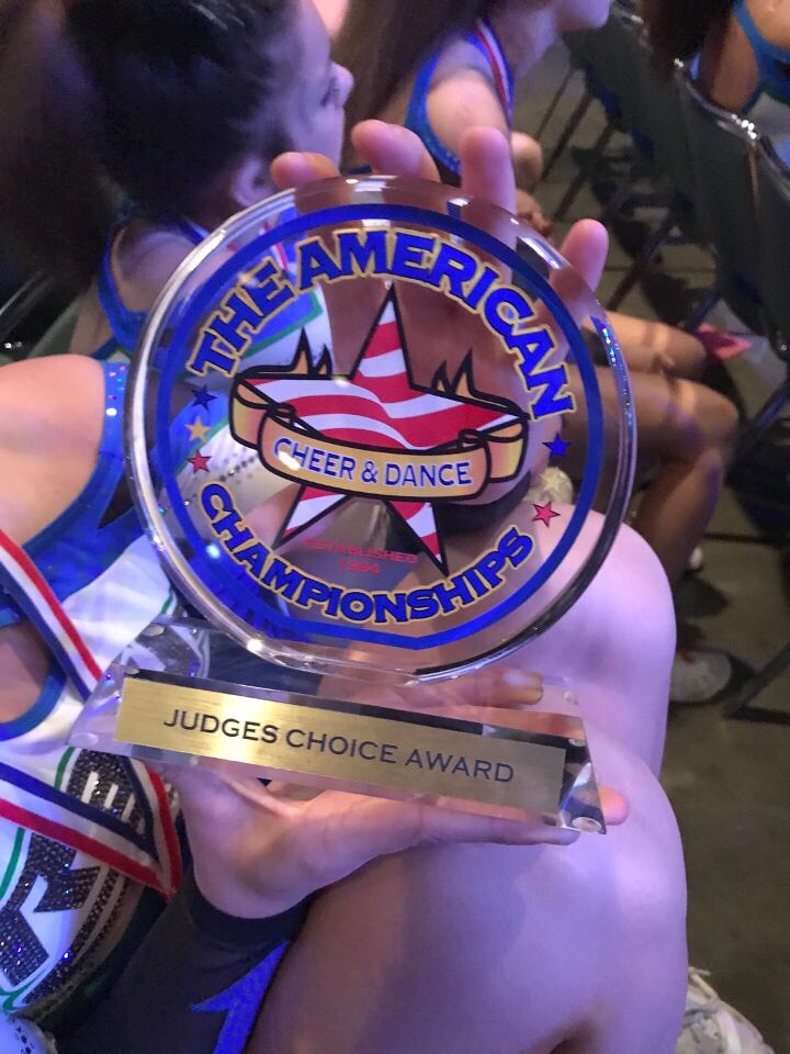 Obsidian_Rays's tweet photo. @AmChamps National Champs and Judges Choice Award. #BigBadO 💙💚 https://t.co/9ePU74j3UP