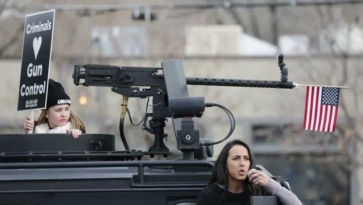 IndivisibleNet's tweet photo. In Utah, NRA terrorists showed up with a machine gun mounted truck to intimidate children.

What is wrong with these people? https://t.co/DEKBW1WtVS