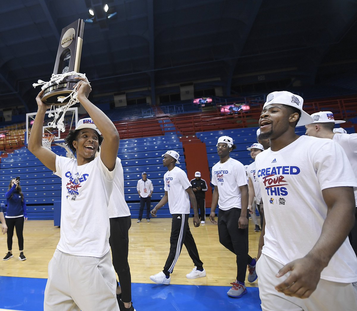 KUHoops's tweet photo. There's no place like home. 

Thank you to the BEST fans in the country for the warm welcome back to the Fieldhouse #KUbball https://t.co/cATJ5MhpBu