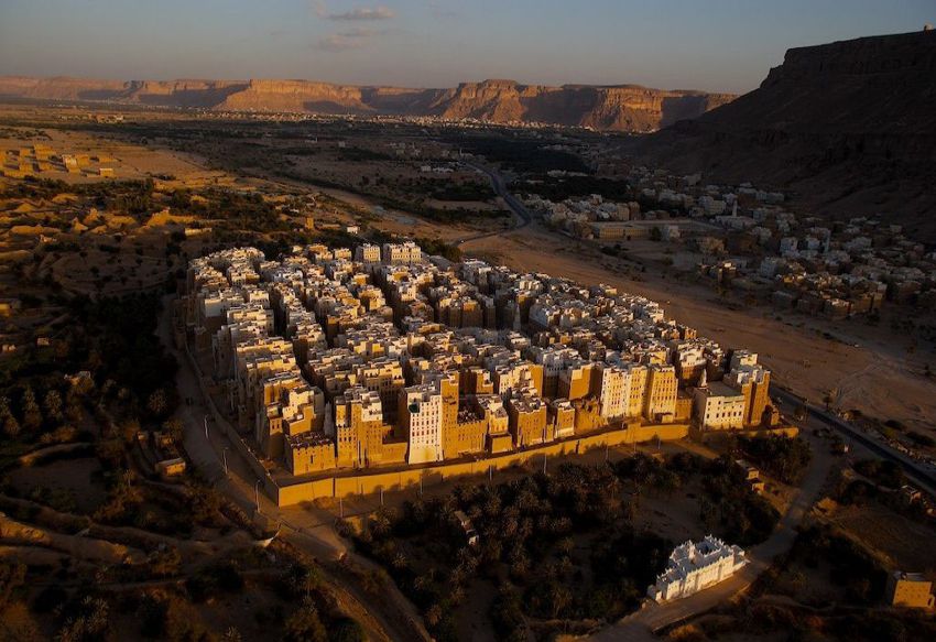 The old walled city of Shibam, Yemen, has been inhabited at least since the 3rd c., an example of perfect desert urbanism. A pop. of 7000 living on 0.03 square km (three times as dense as the the most crowded Wards of London), with houses clustered around the five public squares.