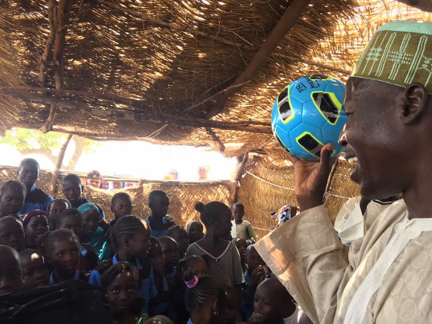 KickForNick's tweet photo. #KickForNick in Cameroon 🇨🇲! In the words of our friends there,”the kids were excited to receive new school supplies, but when they saw the soccer equipment, it nearly caused a riot they were so happy.” #thebeautifulgame #civilaffairs https://t.co/aRBuSRMAvH