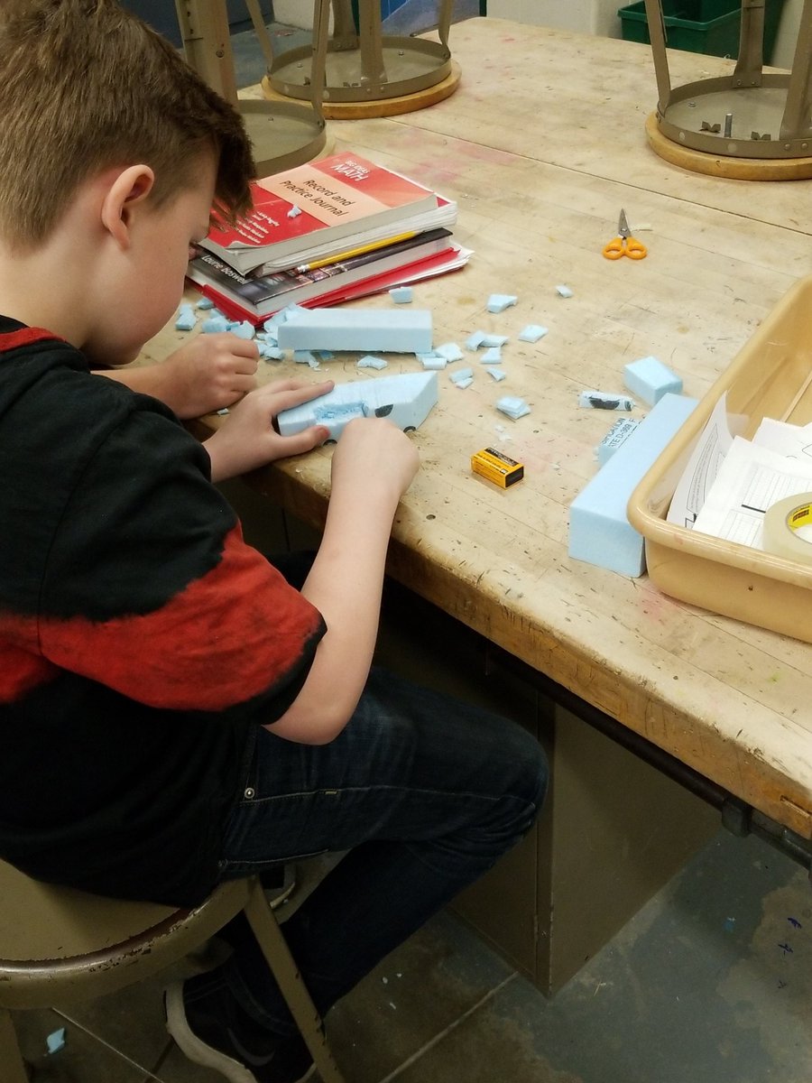 hartstemmd's tweet photo. Our prototypes are almost ready for their motors! We have evolved (kinda like in the real world) and have moved from using rubber bands to motors/batteries as a source of energy. Our designers are hard at work to make sure the cars are ready to use this new level of power 👍#stem https://t.co/9ZkUuFJFDk