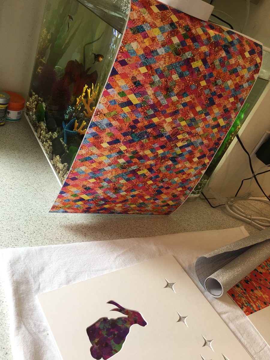 Working on the kitchen countertop, fish are hassling me to be fed (for the 5th time today) cover them up with pretty paper! 😜#halftermadness #wfh #playingcatchup #art #cutoutart #kidsroom
