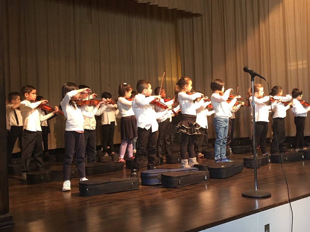 ps50si's tweet photo. Our violin concert in partnership with @nyphil is happening now! Love seeing the skills progression across grades 2, 3, 4 and 5 🎻🎻 #ps50 #thearts https://t.co/6e5rQFev3Q