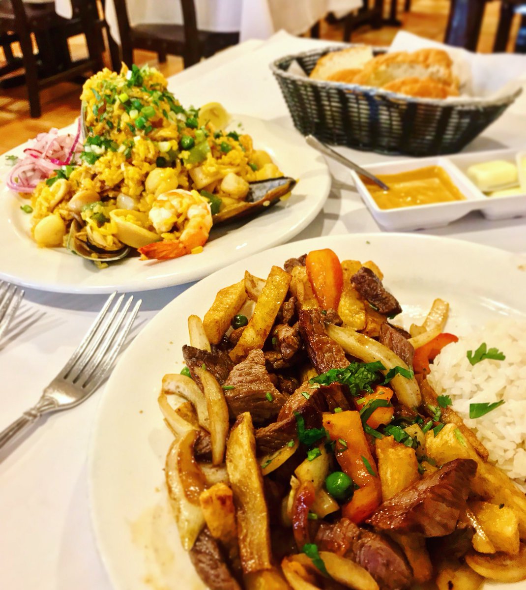 ndrewmarin's tweet photo. Lomo Saltado (sirloin with french fries, rice, onion and tomato). Arroz con Mariscos (rice with scallops, squid, mussels, shrimp, and clam). ❤️ #elChalan https://t.co/9KpgBkERVn