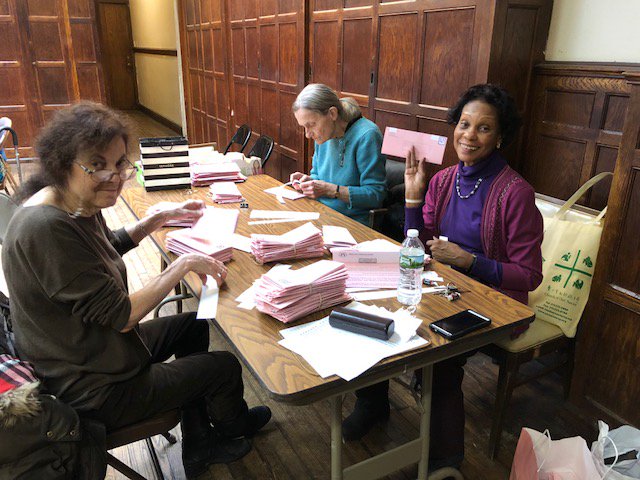 HAFOP's tweet photo. Monique Lemoine (waving on right), our Tuesday volunteer extraordinaire, supervises the group which readies our monthly calendar for mailing to our Health Advocates membership.  A well-organized effort staffed by a steady volunteer group of our Healthy Aging program members! https://t.co/GdjptIWqdf