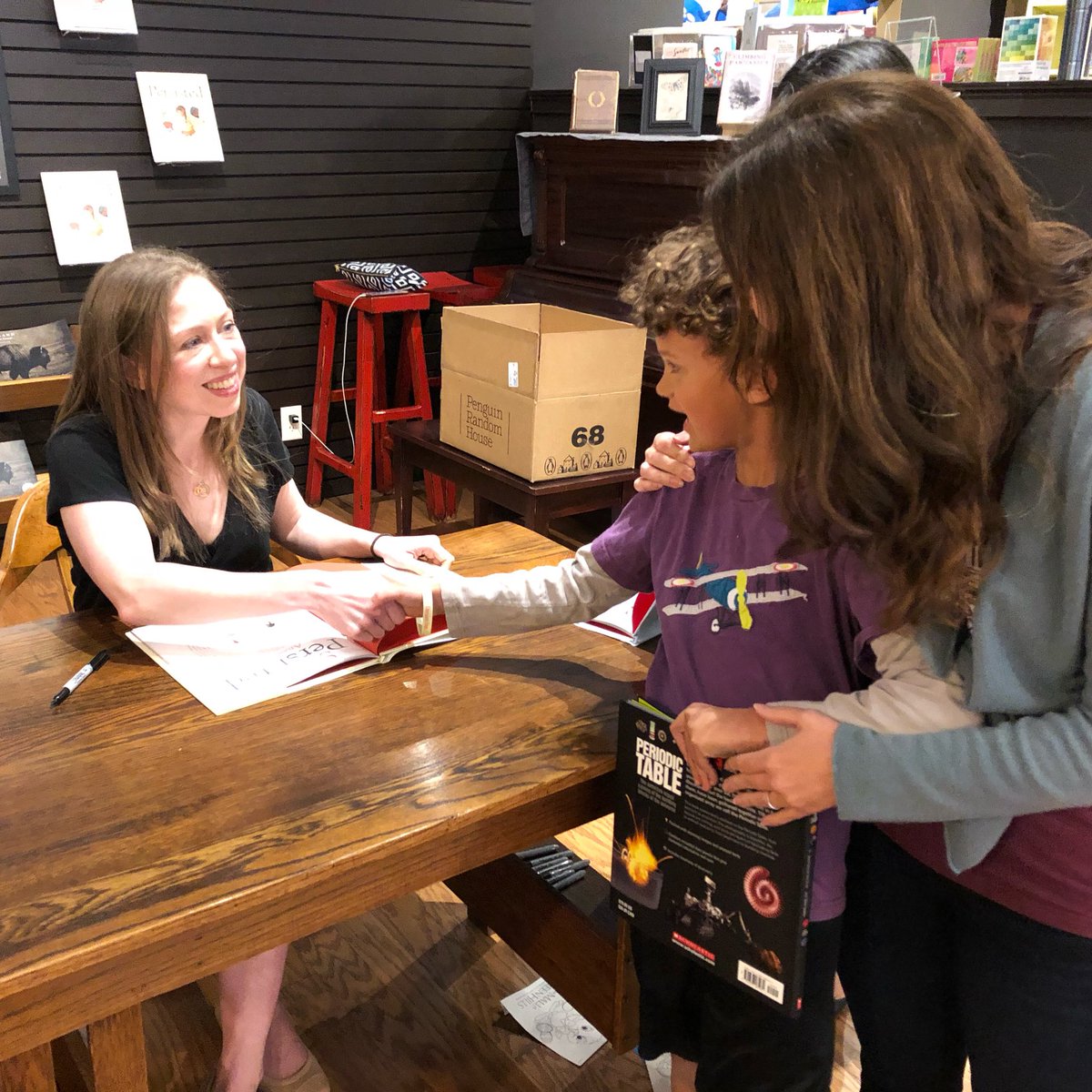SarahHaysCoomer's tweet photo. So... this just happened. Chelsea was digging the Periodic Table book Sky picked out, and we scored signed copies of both of her beautiful She Persisted books. #bookdork #winning 🤓 https://t.co/7hXstwtnzo