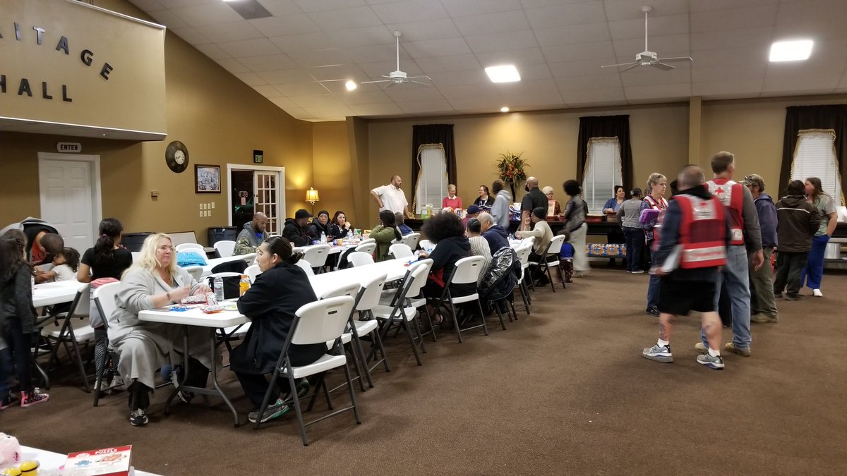 COWYRedCross's tweet photo. #redcross with @csfdpio and @salvationarmy taking care of families displaced by fire at apts on Charleston St in #cospring. 70 people have checked in at evac center at 1st Pentacostal Church on Monica St West. #EndHomeFires https://t.co/wuGUlBZF3u