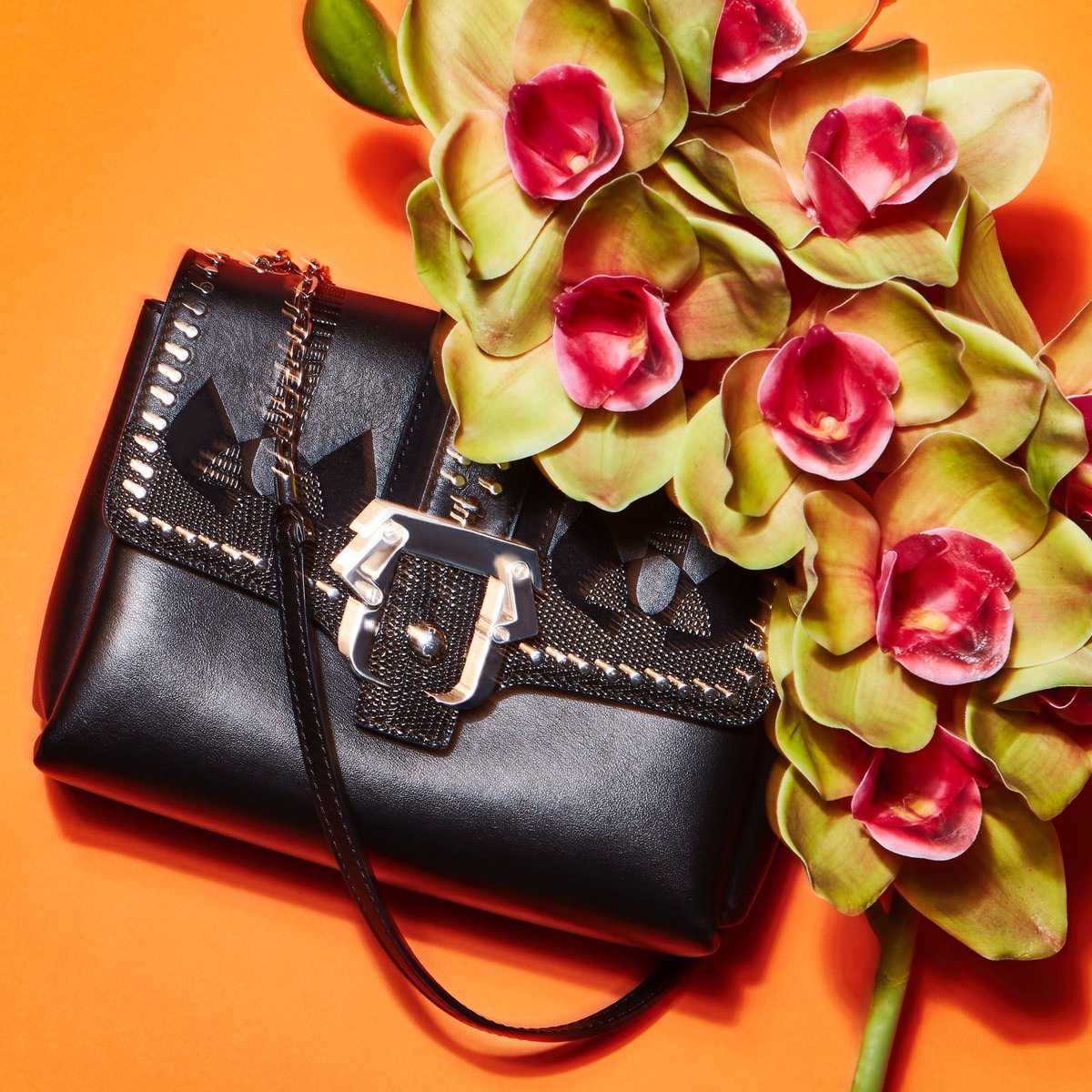 The perfect contrast: flowers vs inlays and studs. Discover the Carine bag! Link in bio 🖤 
#PaulaCademartori  #PaulaCademartoriBags #ss #ss18 #colors #fashion  #shop  #ecommerce #bagcrush #black