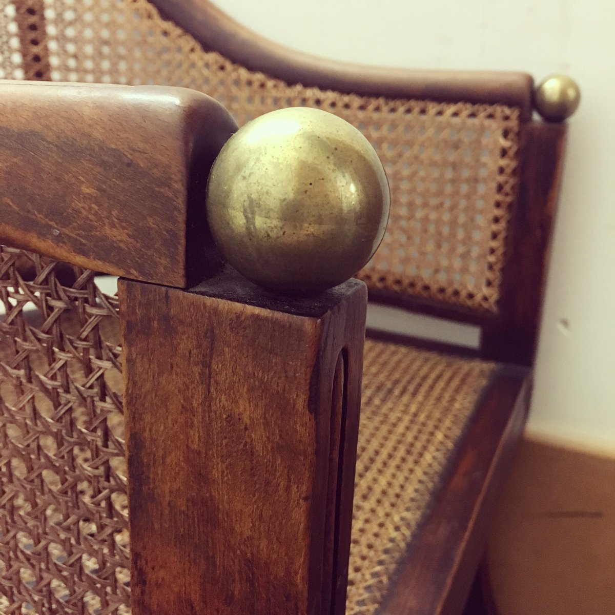 south_rachael's tweet image. Absolutely  love the brass detail on this Regency tub chair, caned and returned to its home in the library. #chaircaning #librarychair #tubchair #regencychair #brassballs