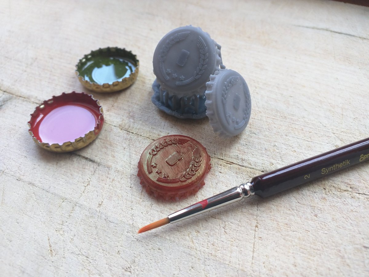 BoozeTheGame's tweet photo. 9 days until our #kickstarter #launch. Aaaand we just got the bottle cap #token #prototype fresh from the 3D printer. We are #painting them right now. https://t.co/RpresskozT