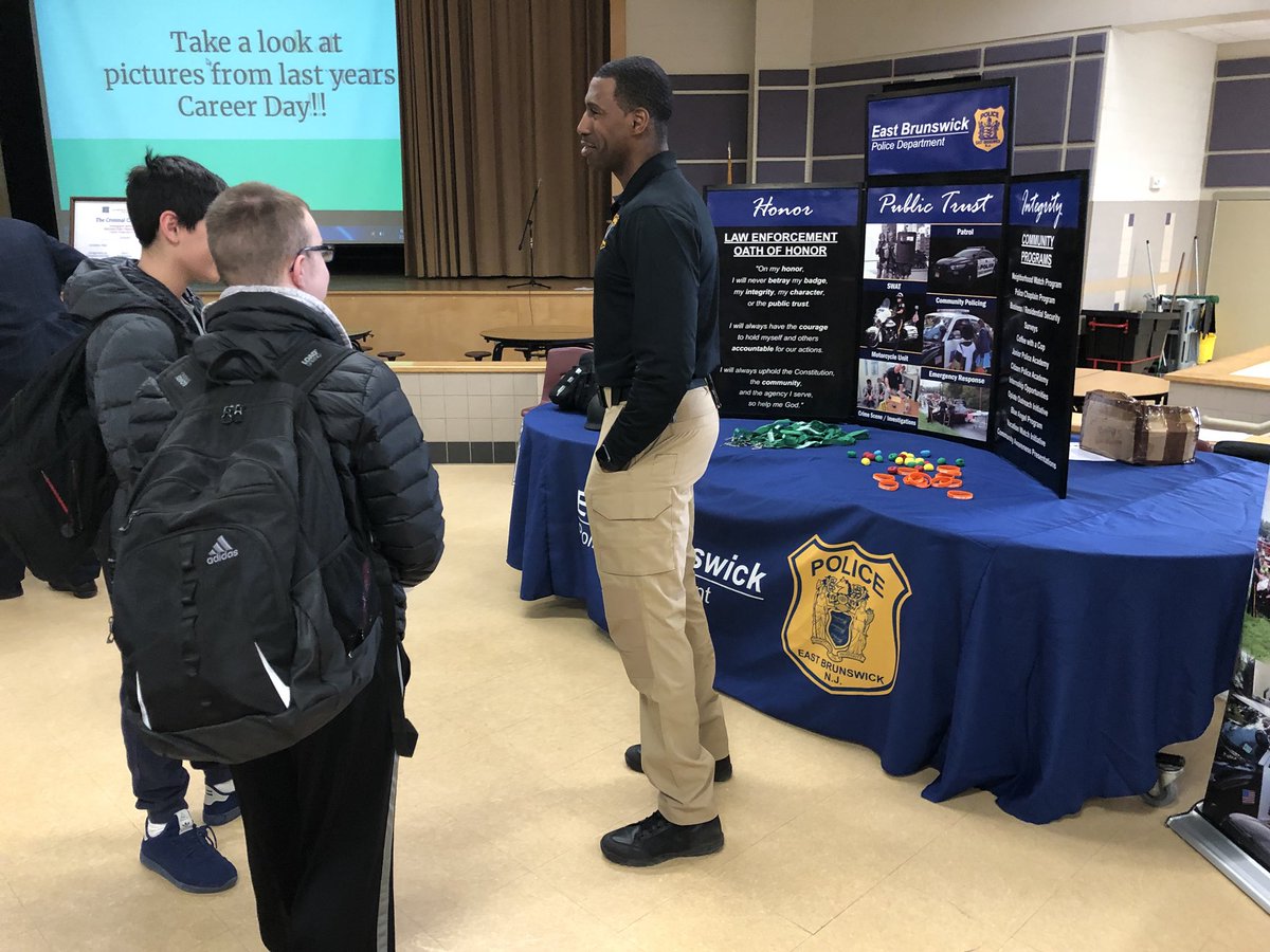 EBPDNJ's tweet photo. The EBPD would like to thank the staff of Churchill Junior HS for inviting us to take part in today’s Career Fair. Students had the opportunity to speak with Ptl. Reggie Wright and Ptl. Jason Fama and ask questions regarding the law enforcement profession. #School #Career #Fair https://t.co/qUcAHJm9T9