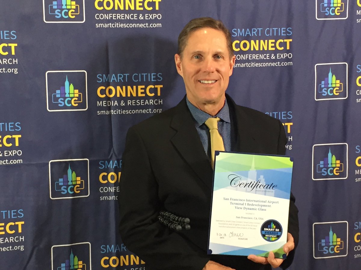 view_inc_'s tweet photo. View VP @JeffPlaton was happy to receive the Smart Cities award on behalf of #viewglass last night. Thank you all at @smartcityc #scc18 and @US_Ignite! https://t.co/kQzPEMIp3m