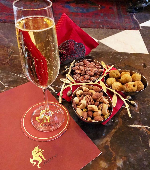 Champagne is always the answer #knavecafe #parkernewyork #theparkerny #friedolives #smokedalmonds #mixednuts