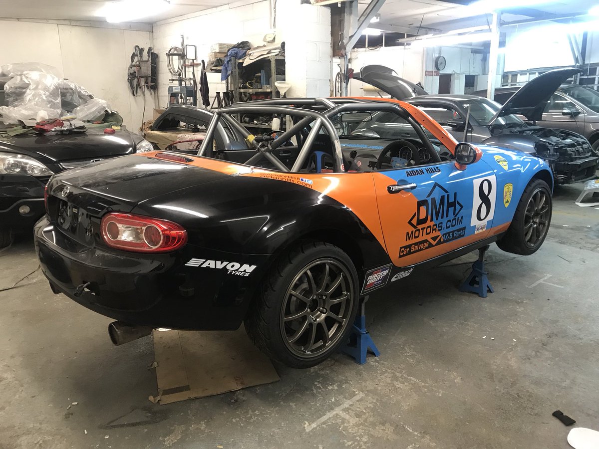 AidanHills8's tweet photo. Here she is our 2018 @MX5SuperCup race car, ready to go to battle this weekend at Silverstone for round 1/2/3 of the championship! Canβt wait to get back in the car on Friday #AH8 #Silverstone #mx5supercup #TCRUK @BrsccHQ @TCRUK_series https://t.co/QMMsEo3Snf