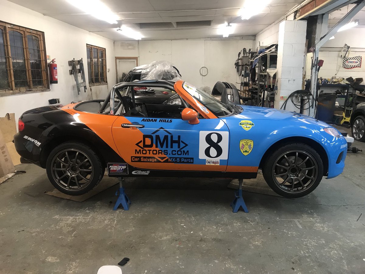 AidanHills8's tweet photo. Here she is our 2018 @MX5SuperCup race car, ready to go to battle this weekend at Silverstone for round 1/2/3 of the championship! Canβt wait to get back in the car on Friday #AH8 #Silverstone #mx5supercup #TCRUK @BrsccHQ @TCRUK_series https://t.co/QMMsEo3Snf