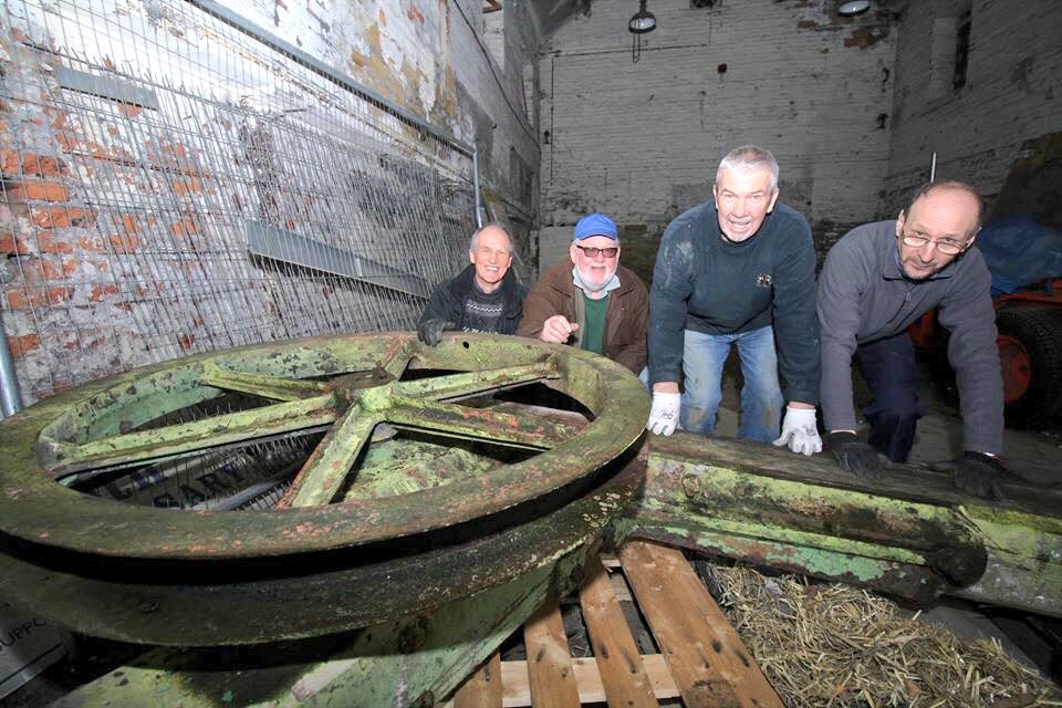 DiscoverElsecar's tweet photo. What an object, building and teamwork! We’re hoping to transform this space (v early part of The Ironworks) soon. In the meantime, perfect new home for this huge industrial crane, still with remnants of @Wentworth_house estate green paint! https://t.co/EQsRPggPtH