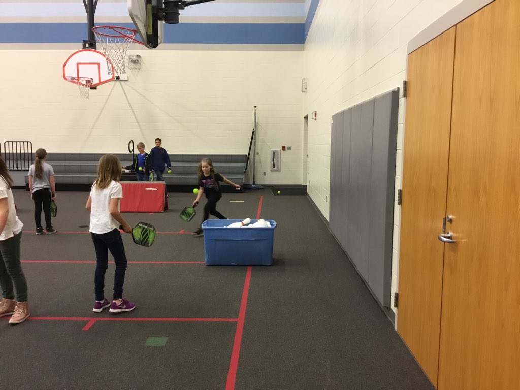 Fourth grade Ss enjoying pickle ball in PE.  Thanks <a href="/ChickenNPickle/">Chicken N Pickle®</a> for the equipment.  <a href="/MadisonPlaceK5/">Madison Place</a> @olathepeteacher